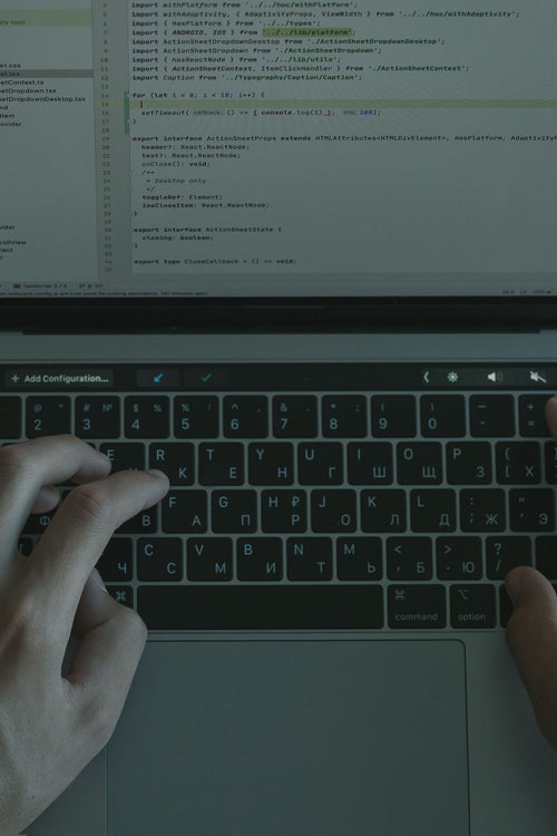 Website development - coding on a laptop